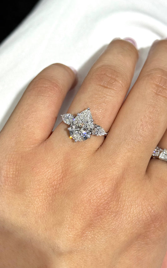 IGI certified diamond
	•	floral engagement ring
	•	cluster diamond ring
	•	eco friendly engagement
	•	3 carat engagement ring
	•	E VS diamond
	•	pear cut diamond ring
	•	lab diamond bridal
	•	ethical diamond ring
	•	unique engagement ring
	•	white gold diamond ring