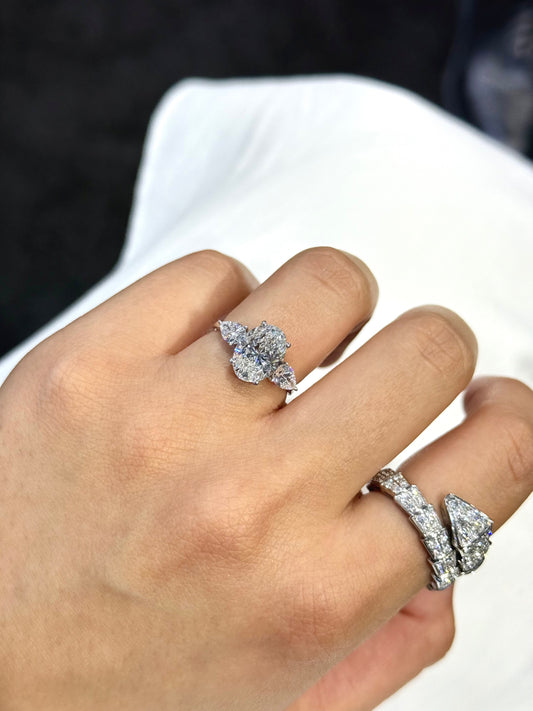 3.70ct lab grown oval diamond ring with pear side stones on white gold band