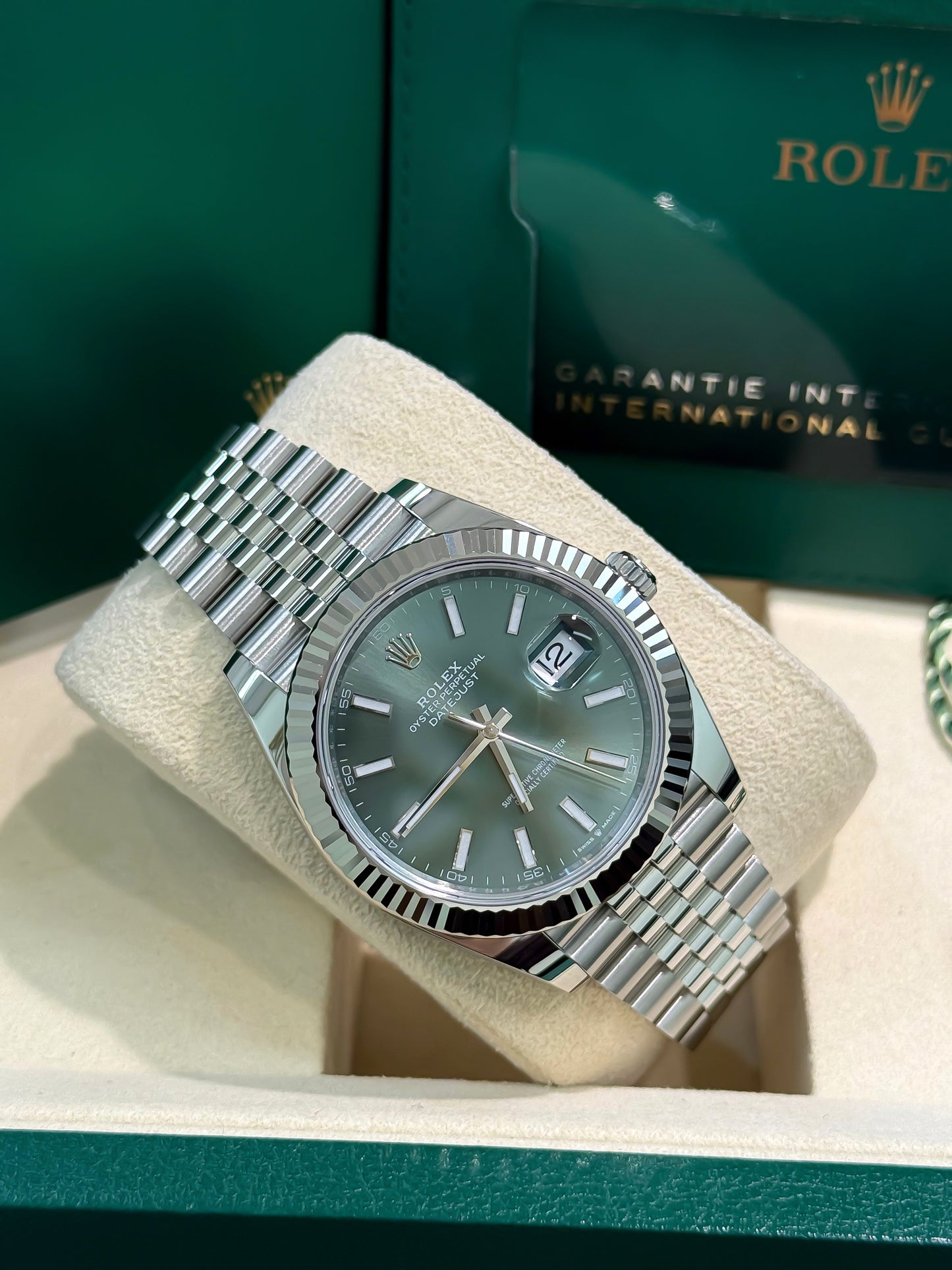 126334 ROLEX datejust 41mm New, Stainless Steel Jubilee band with 18K White gold fluted bezel. Green index dial. Mint green dial. Date just II. 