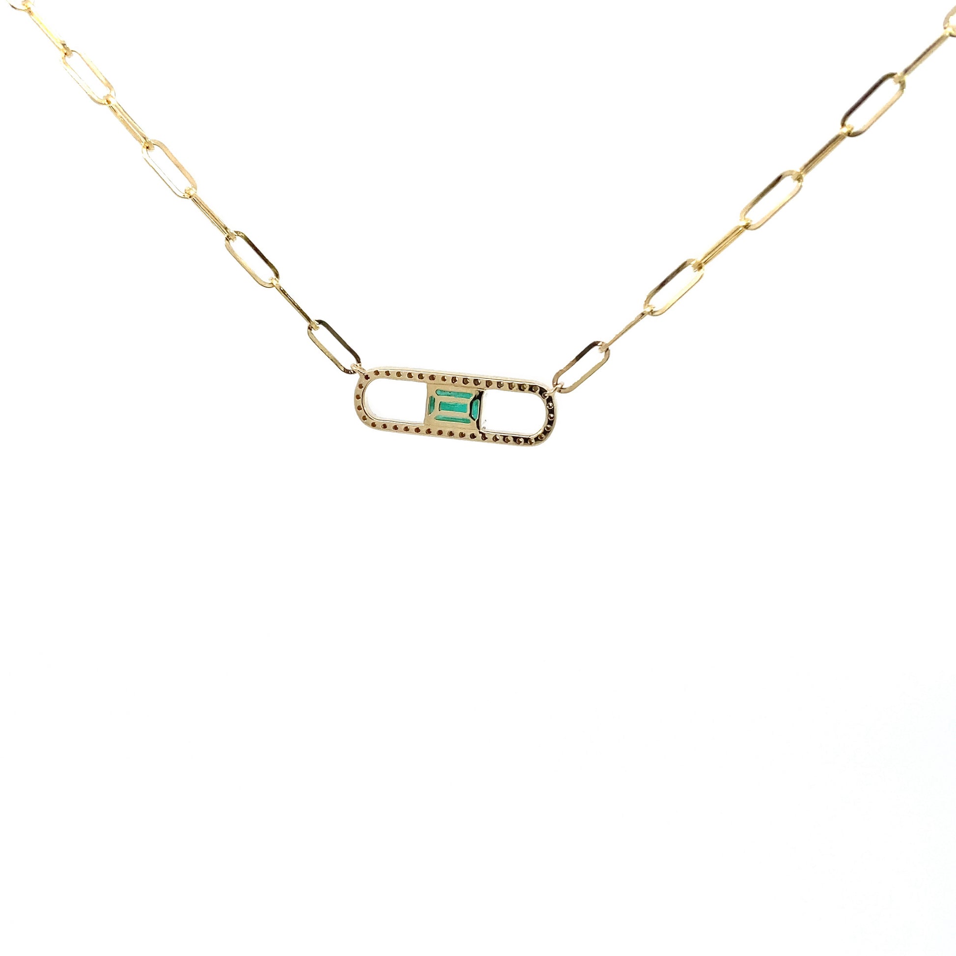 14K Solid Yellow Gold necklace with a green Emerald and diamond gemstone pendant on a white background. Trendy 14K yellow gold Paperclip necklace. 